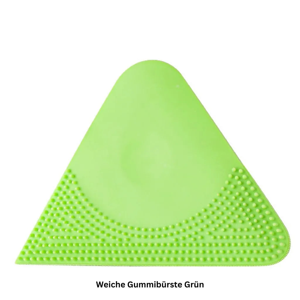Kompakte grüne Gummibürste – ideal für unterwegs