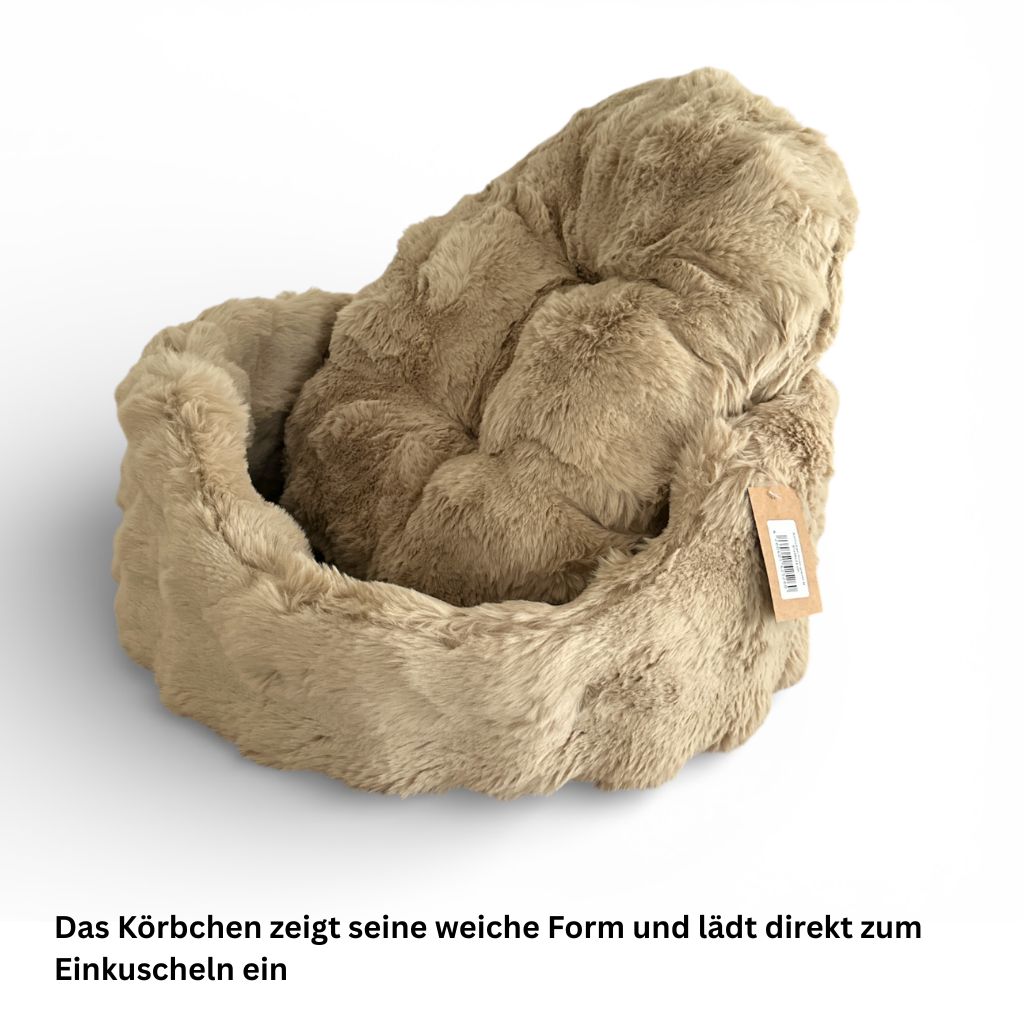 Beiges Hunde Bett Nomi in seitlicher Ansicht mit weicher Polsterung und erhöhtem Rand.