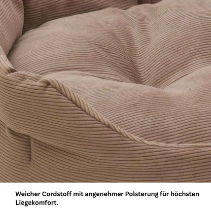 Nahaufnahme der weichen Breitcord-Struktur und der dicken Polsterung des braunen Haustierbetts.