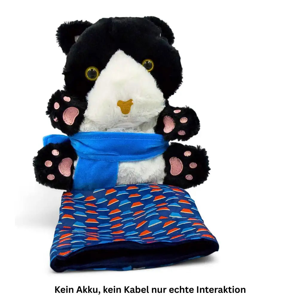 Interaktive Katzenhandpuppe in Schwarz-Weiß mit blauer Schleife und rotem Muster